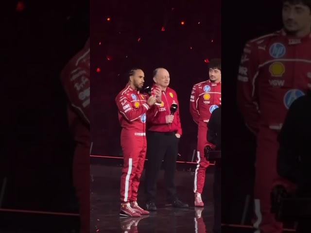 Lewis Hamilton receives an ovation from fans during the Ferrari presentation at the F175 lilve