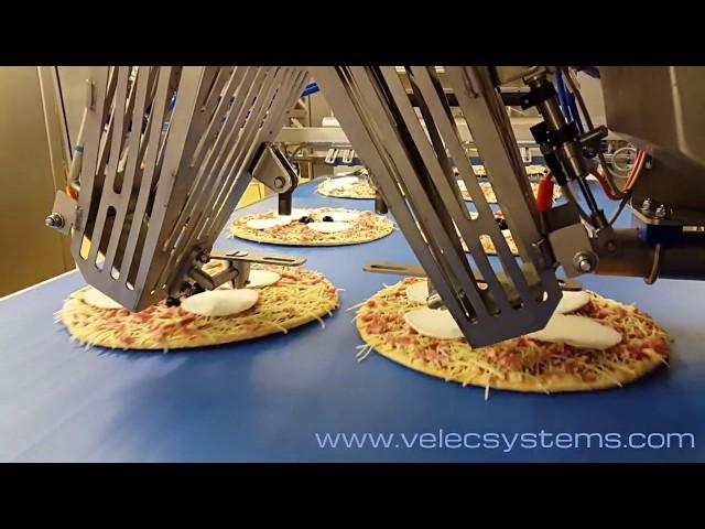 Olives onto pizza | Velec Systems  