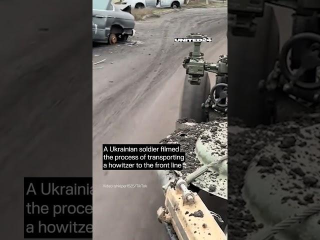 Howitzer Goes to Frontline. Ukrainian Soldier Shows the Process of Transporting Military Equipment