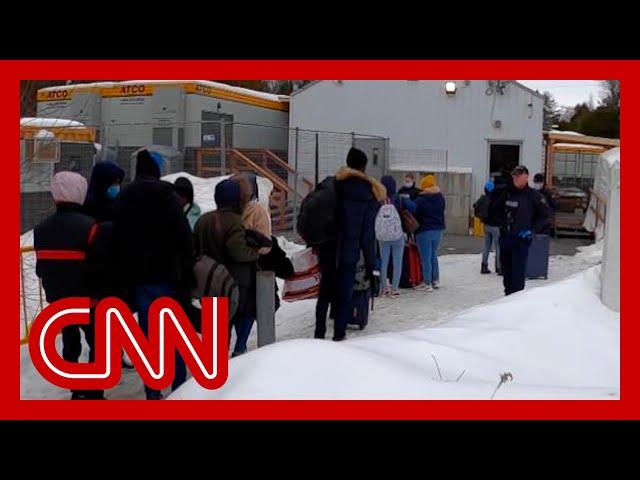 CNN follows migrants illegally entering Canada from New York road