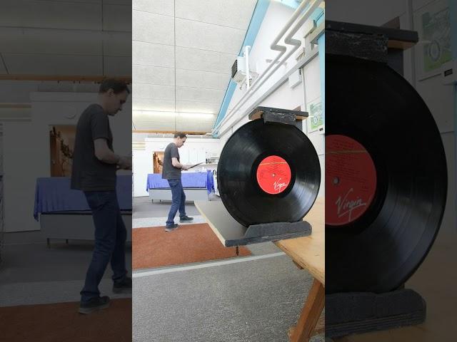 Shoot an arrow through LP record