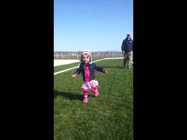 V running at vineyard
