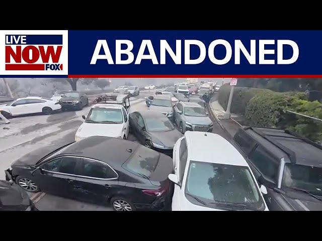 California Fire: Cars abandoned by drivers and bulldozed in LA