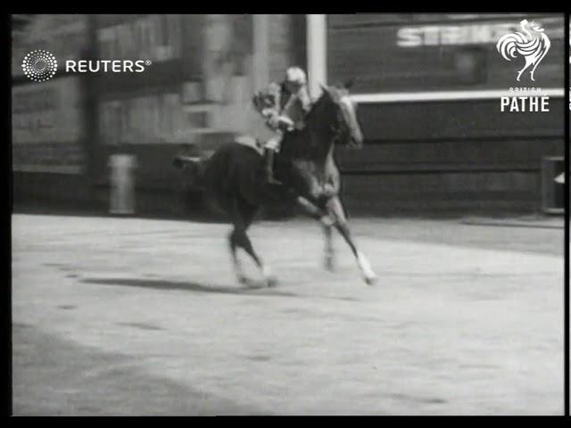 ATHLETICS: Sprinter Jesse Owens wins race against a horse (1937)