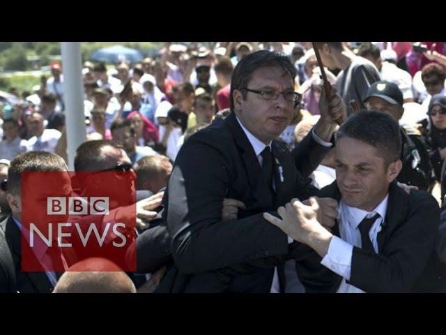 Srebrenica: Serb PM Vucic flees ceremony - BBC News