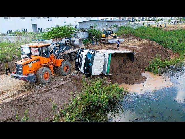 Sadly!! The Dongfeng Dump Truck Overturned into the wrong water Fortunately​ operator driver Safety