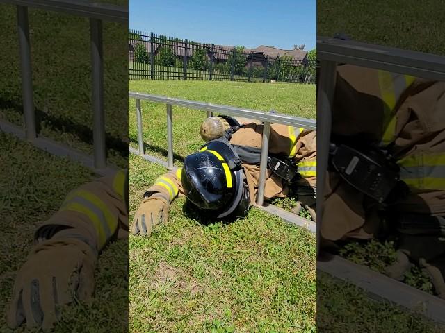 Firefighting Students Squeeze Through Ladder in Full PPE