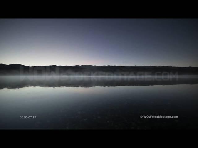 The Milky Way rises behind the Dunstan Range and Lake Dunstan, Central Otago, New Zealand