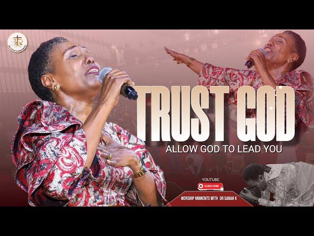 Dr. Sarah K - TRUST IN GOD