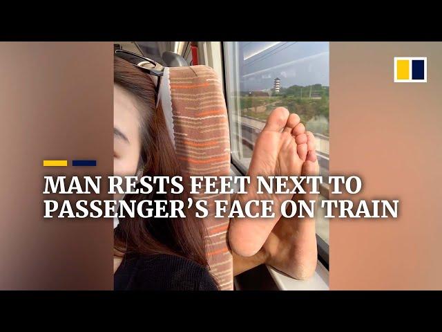 Man rests bare feet next to passenger’s face on train in China