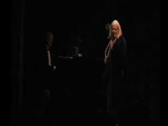 Lucianne Goldberg sings "Smile" at the Singing Experience