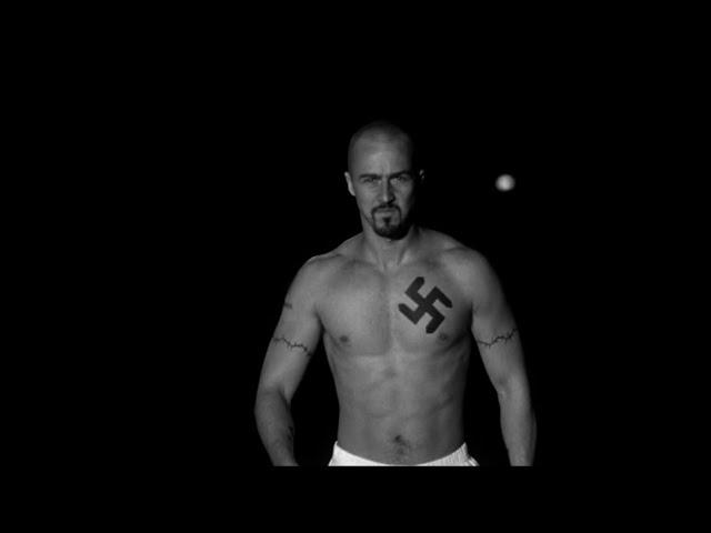 American History X (1998) - There is a black guy outside breaking into your car!