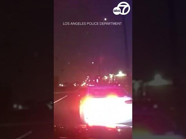 Suspect armed with machine gun fires on 2 LAPD officers | #shorts