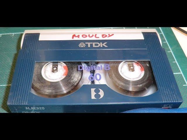 Repairing 8mm video tapes with mould and other damage.