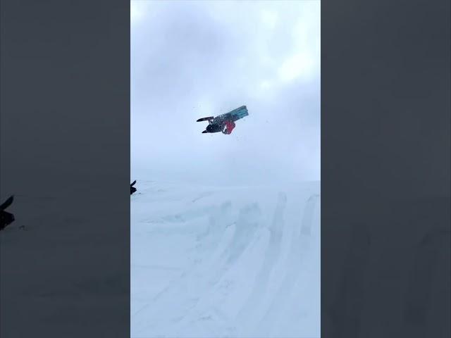 Snowmobile trick in the air