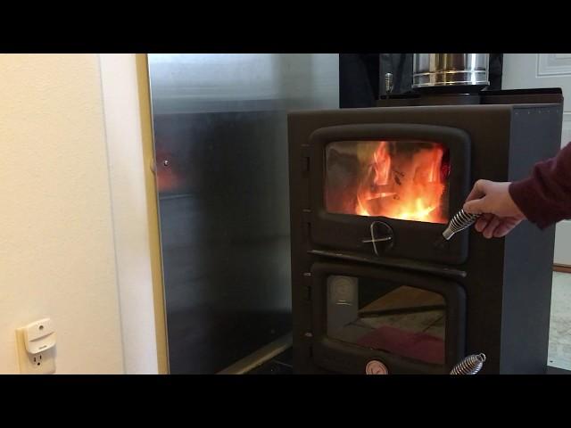 Lighting a fire in the Nectre Bakers Oven.