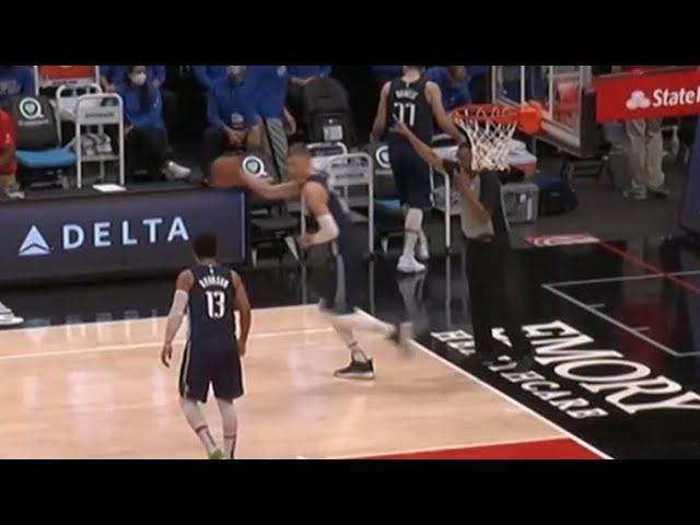 Kristaps Porzingis inbounds the ball to himself, ref watches him and does nothing