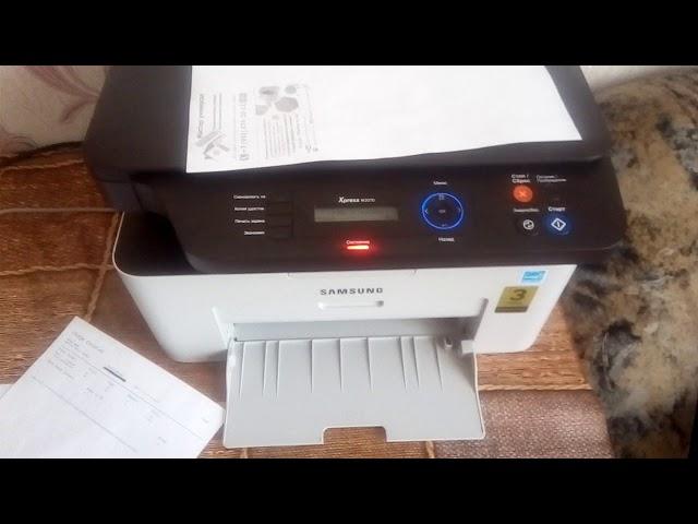 Hacking a printer for FREE! M2070