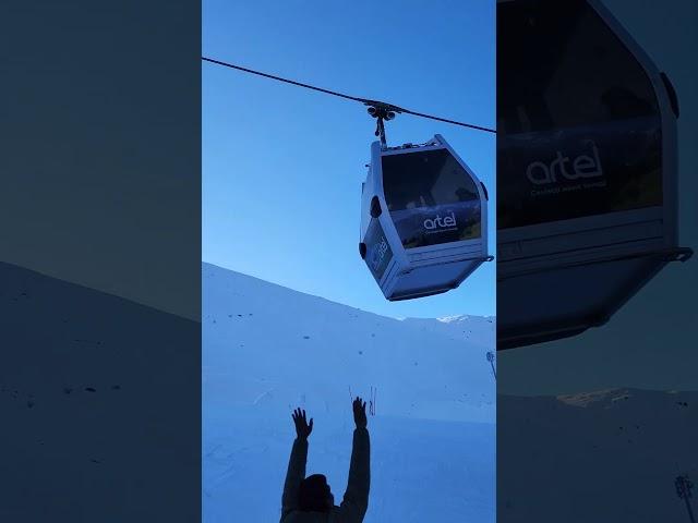 Ascending to winter wonderland heights! ️️ #Gondola #SnowyPeaks #MountainMagic #travelmodeon