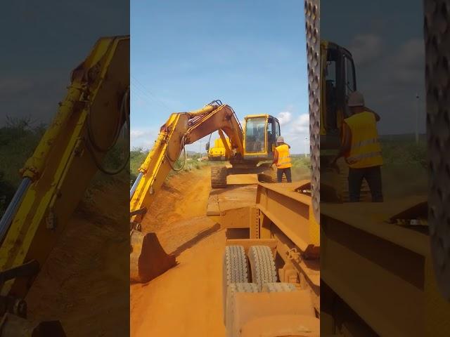 loading excavator on lowbed