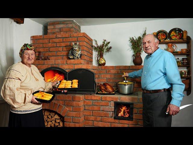 Happy old age of an elderly couple in the village / Christmas Eve