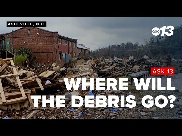 What's happening to storm debris around Asheville?