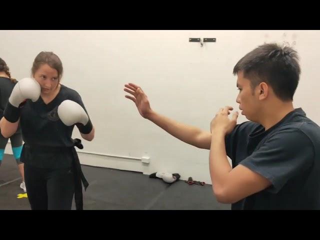 JK Wing Chun - Practicing blocking punches.