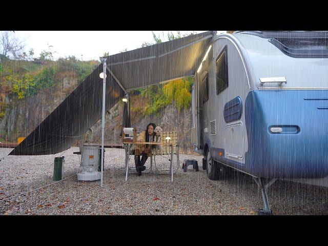 A girl enjoying delicious solo camping in the rain, adventure in a caravan