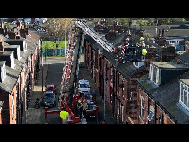 MALE ON ROOF ‘SLINGING TILES’ AS EMERGENCY SERVICES RUSH TO SCENE