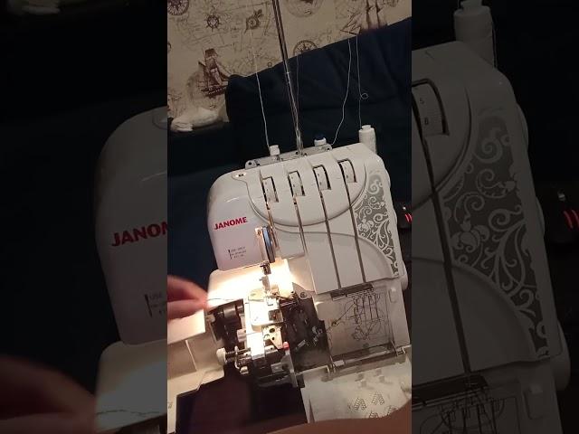 заправка ниток  оверлок джаноме janome 724 d