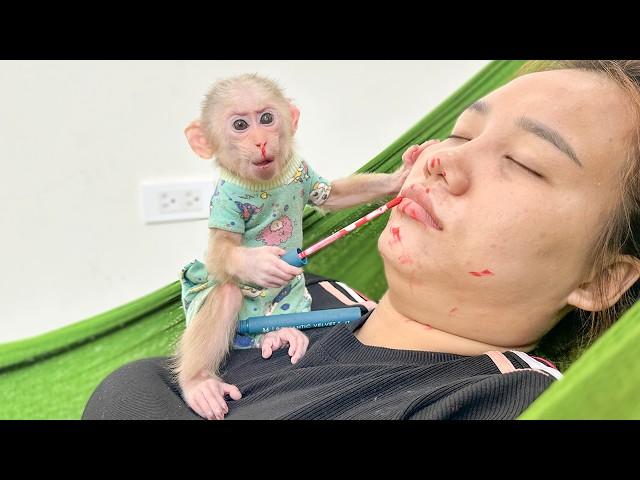 Super funny! Lala playfully applied lipstick to Thuy's face