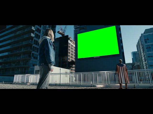 Homelander Looking at a Big Green Screen