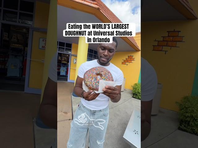 Eating the world‘s largest doughnut at universal Studios in Orlando ￼