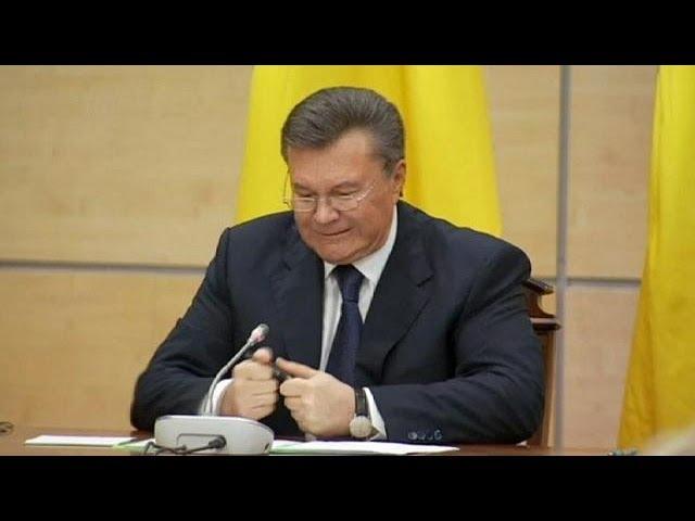 Yanukovych snaps pen in anger at press conference