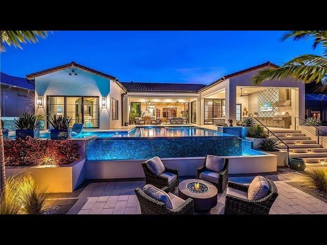 This $4,500,000 Remarkable home in Cape Coral Florida has a magnificent infinity edge pool and spa