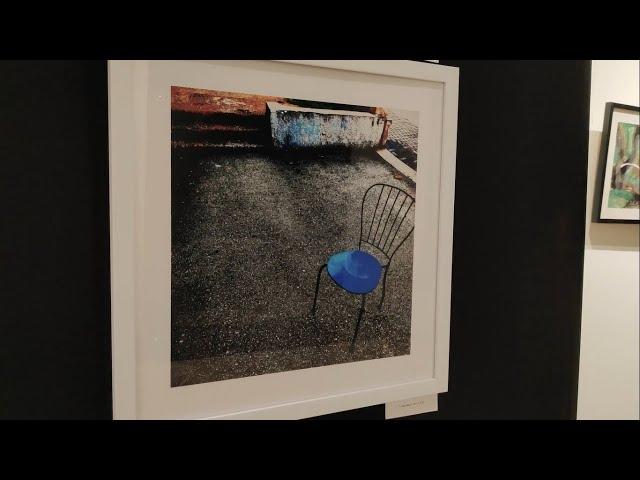 Two Photographs of a Chair at Harmony Cultural Center Art Show - May 2022