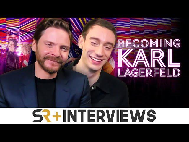 Becoming Karl Lagerfeld's Daniel Brühl & Théodore Pellerin Talk "Fascinating" True Story & The MCU