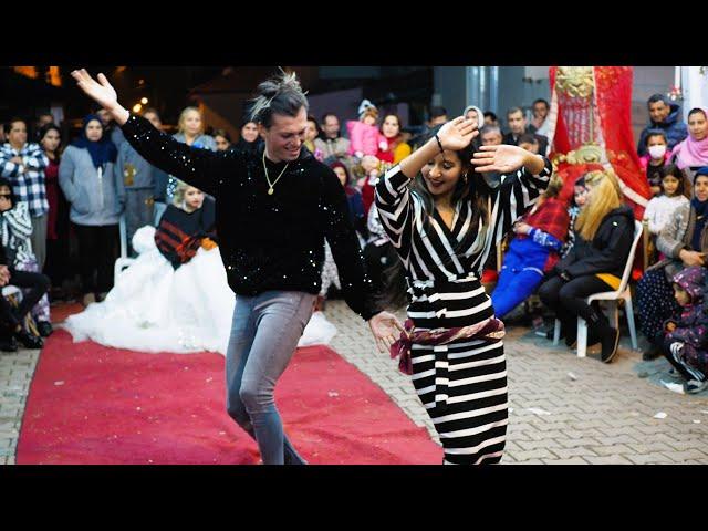 2 girls dancing crazy at wedding party 