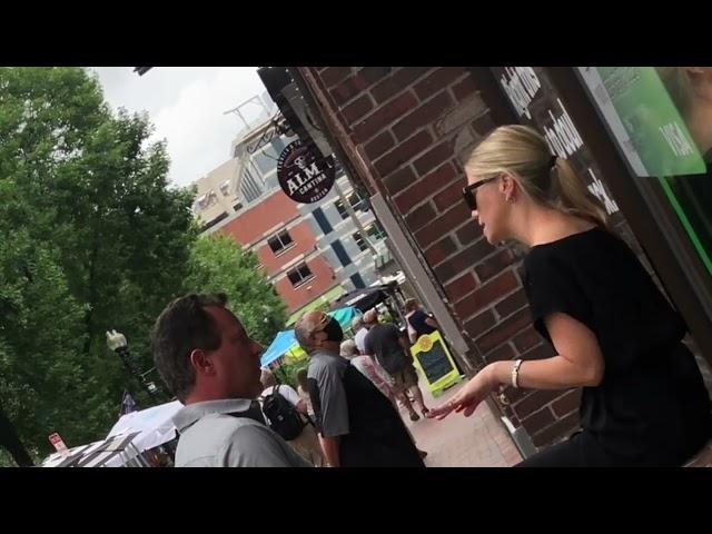 Cute blonde woman smoking cigarette candid