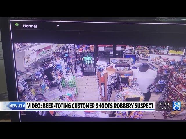 Video: Beer-toting customer shot at robbery suspect 7 times