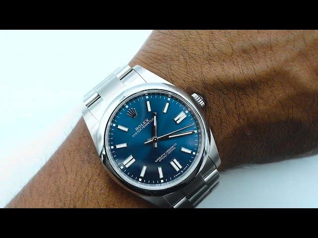 Rolex 124300 Oyster Perpetual 41 mm Smooth Bezel Blue Dial Oyster Bracelet Complete Set 2024