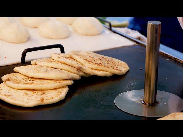 Hotteok (Sugar-filled Griddlecake) - Korean Street Food