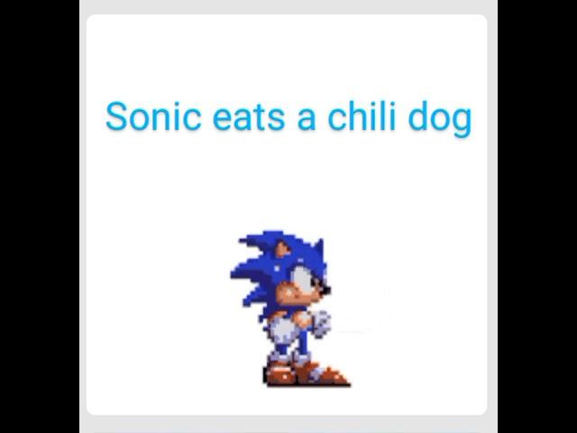 Sonic eats a chili dog.