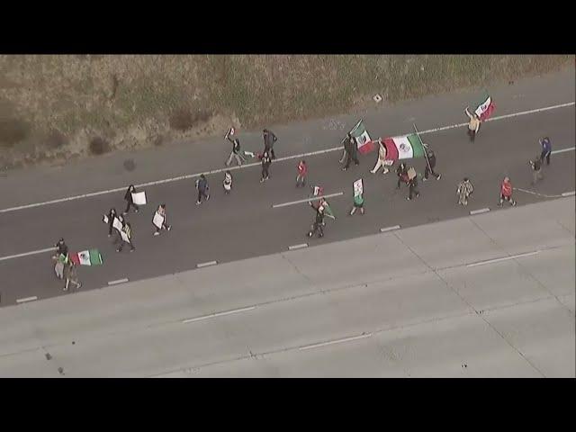 San Diego protesters take over I-5 freeway near Coronado exit