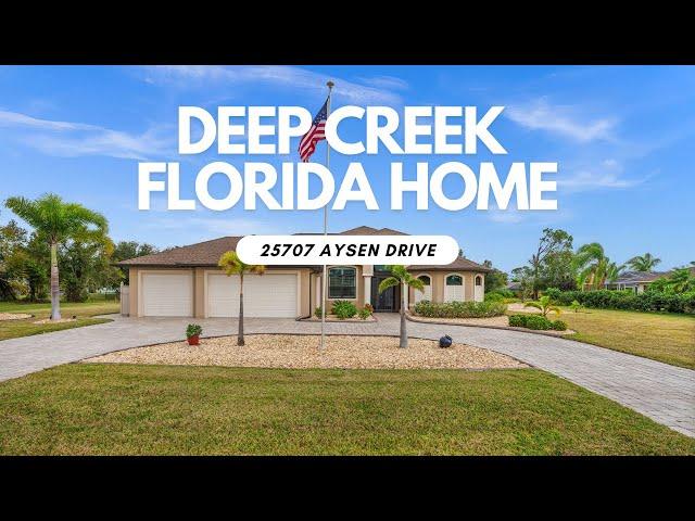 Stunning Deep Creek Pool Home on a Double Lot! | 25707 Aysen Drive, Punta Gorda, FL 33950