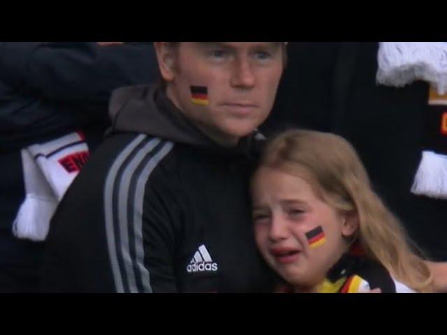 England fans cheering when German girl in tearing