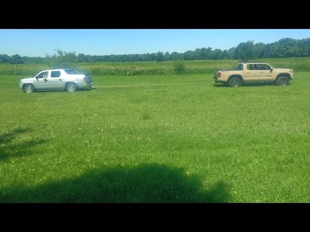 Honda ridgeline vs toyota tacoma