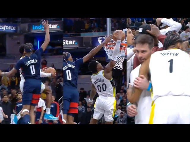 Bennedict Mathurin INSANE windmill dunk under Coulibaly's arm to end game 