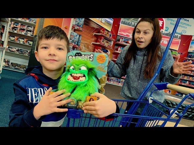 Den and the green monster in the toy store