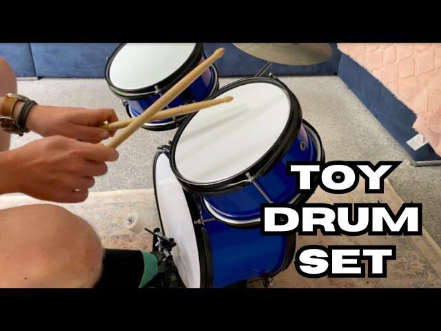 I bought my kids a toy drum set and tried it out first!